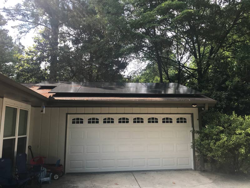 house with solar panels on roof