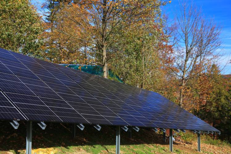 Photovoltaic solar panels installed on a rooftop for renewable energy generation in Atlanta, GA.