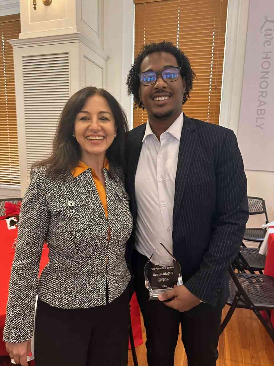 Wide shot of a suburban home showcasing a clean, aesthetic solar energy system, in Atlanta, GA